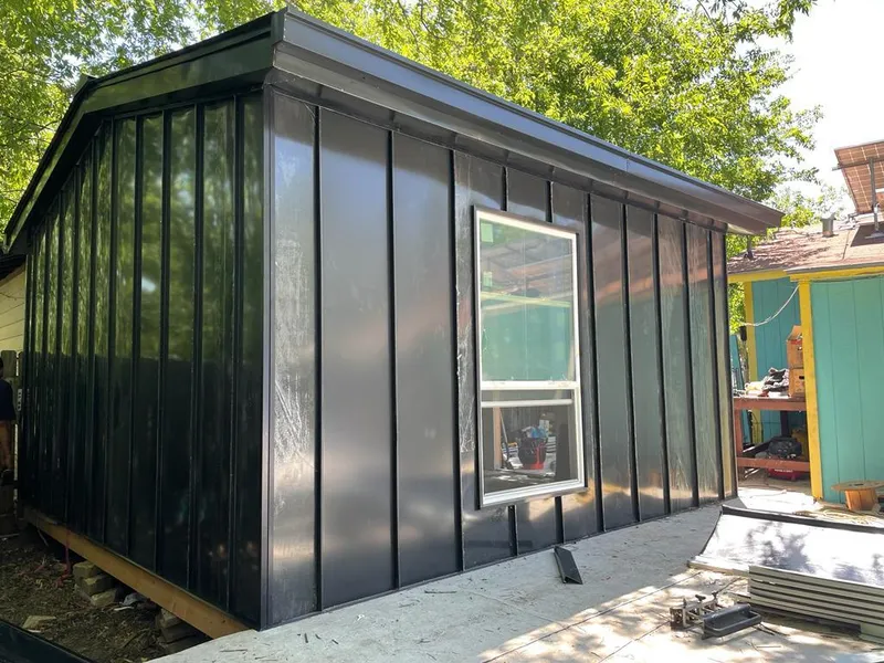 Black standing seam metal wall panels for Metal Roof Installation in Kensington